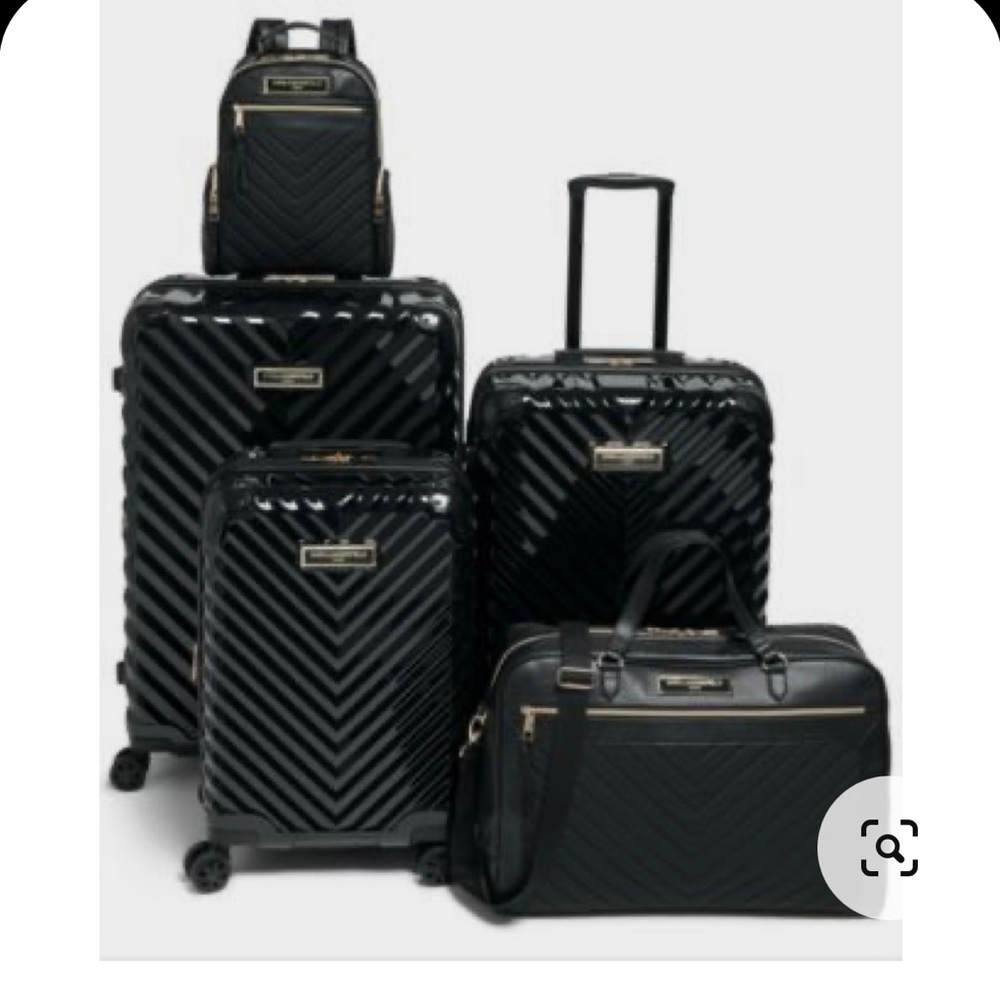 Karl Lagerfeld Luggage set. Carry on roller luggage, carry on bag and book bag.
